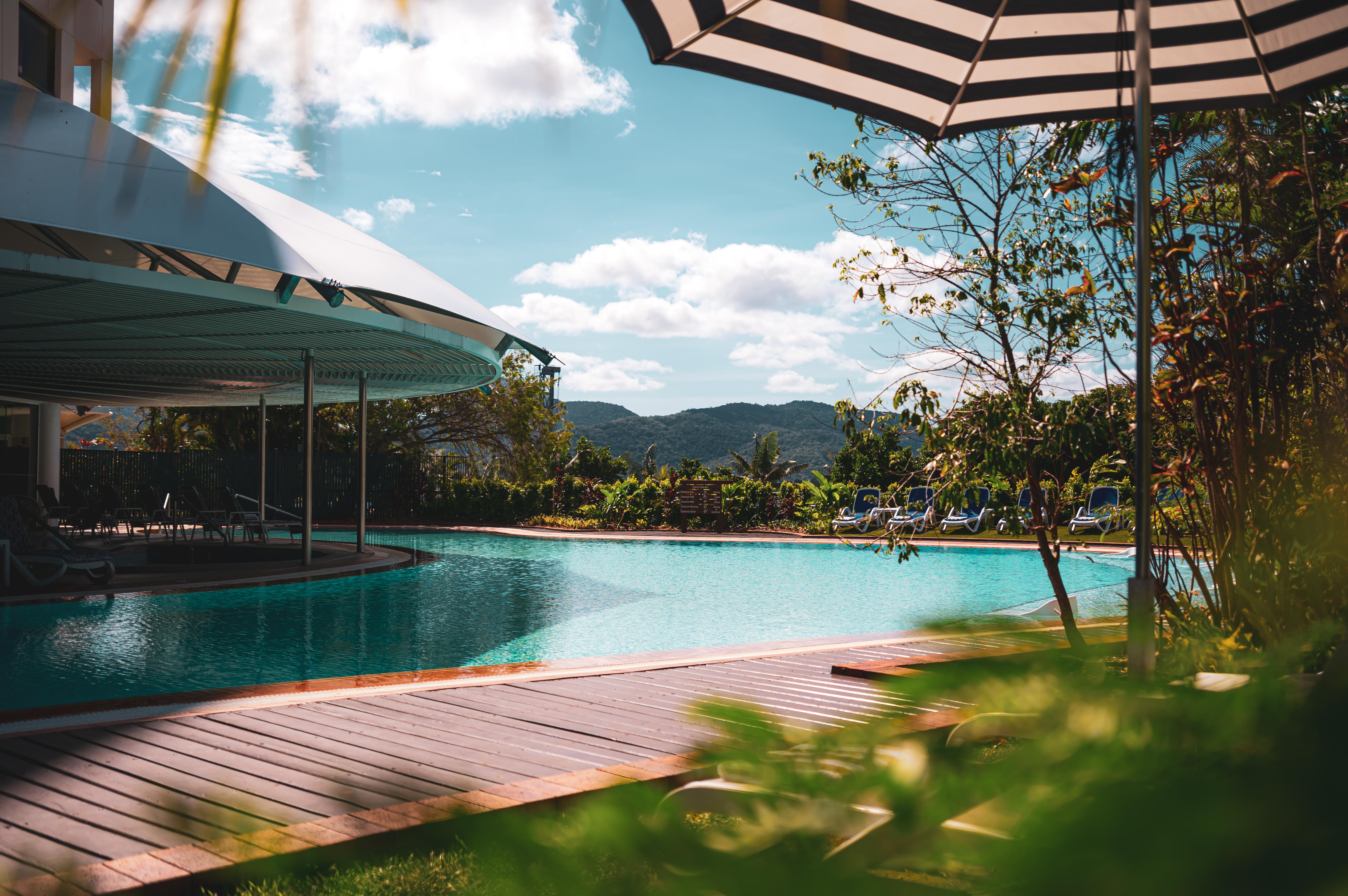 Hilton Cairns Hotel Exterior photo The swimming pool at the resort