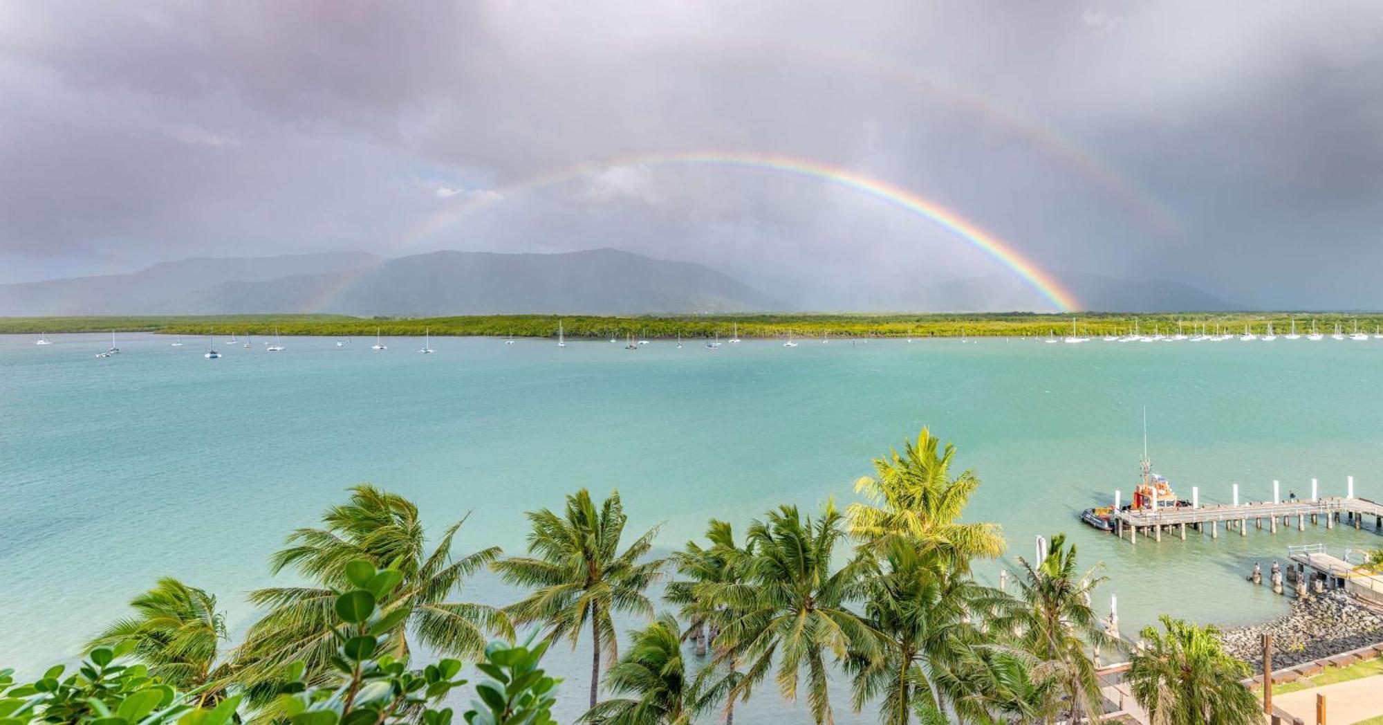 Hilton Cairns Hotel Exterior photo Rainbow over the bay